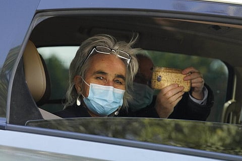 Marion Koopmans of the World Health Organization team of researchers looks out from a car during a field trip in Wuhan in central China's Hubei province on Friday, Jan. 29, 2021. (Photo | AP)