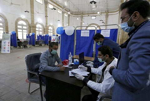 Paramedic staff attend a training session at a center newly setup for upcoming COVID-19 vaccination, in Karachi. (Photo | AP)