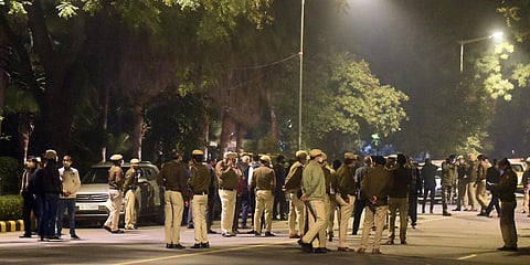 Security personnel inspect the area after a low intensity blast outside the Israeli Embassy, in New Delhi. (Photo| Parveen Negi, EPS)