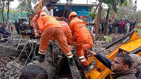 Rescue operation carried out by NDRF personnel after the complex roof of a crematorium collapsed in Ghaziabad. (Photo | PTI)