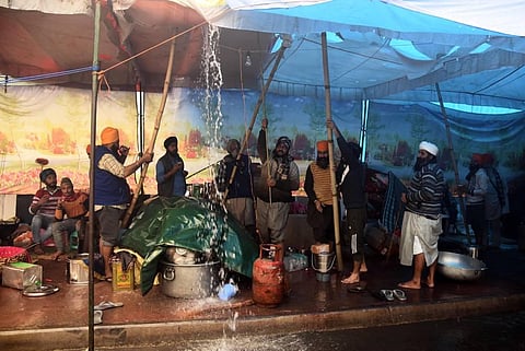 Despite the adverse weather conditions, the farmers said their protest will continue till the Centre repeals these legislations. (Photo | Parveen Negi/EPS)