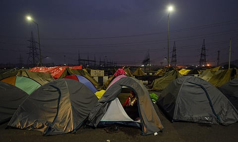 Farmers rest inside their makeshift tents during the ongoing protest over Centre's farm reform laws, at Delhi-UP border near Ghazipur. (Photo | PTI)