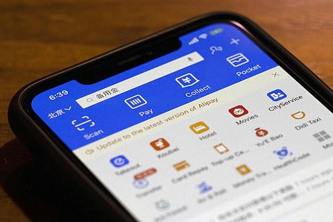 This July 20, 2020, file photo, shows, the app for Alipay, the mobile payments service operated by Ant Group, on a smartphone in Beijing. (Photo | AP)