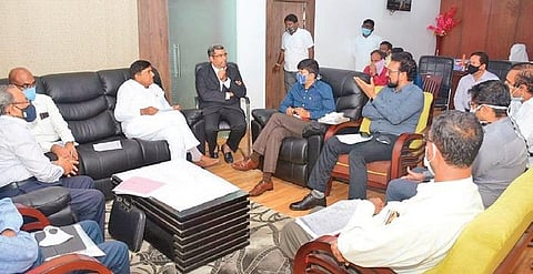 TS Planning Board Vice Chairman B Vinod Kumar interacts with Railway and Karimnagar and Rajanna-Sircilla district authorities on Wednesday.
