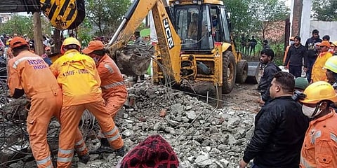 Rescue operation carried out by NDRF personnel after the complex roof of a crematorium collapsed due to heavy rain at Muradnagar in Ghaziabad on January 03, 2021. (Photo | PTI)