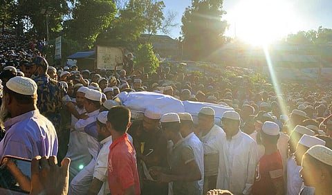 Rohingya refugees carry the body of Mohibullah, an international representative of ethnic Rohingya refugees, for burial, in Kutupalong, Bangladesh. (Photo | AP)