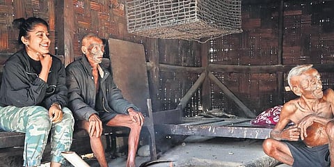 Kavya Saxena (L) with the Konyaks of Nagaland