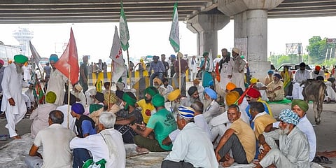 Farmers block the Sonipat-Panipat road during their 'Bharat Bandh' against central government's three farm reform laws. (Photo | PTI)