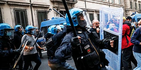 Italian police is riot  gear disperse protestors in Rome. (Photo | AP)