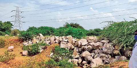 The stone alignment destroyed at the Mudumal megalithic site in Narayanpet.