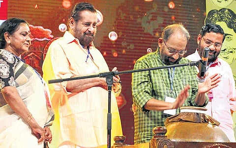 Nedumudi Venu playing mizhavu at Natanam Venulayam programme  organised by the film fraternity to celebrate his 40th year in cinema held at Nishagandhi auditorium in Thiruvananthapuram. Actors Madhu,