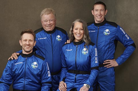This undated photo made available by Blue Origin in October 2021 shows, from left, Chris Boshuizen, William Shatner, Audrey Powers and Glen de Vries. Their launch scheduled for Wednesday, Oct. 13, 202