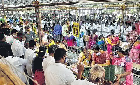 Staff engaged in counting of votes in the rural local body elections at a centre near Tambaram in Chengalpattu on Monday | ashwin prasath