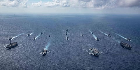 The United Kingdom's carrier strike group sails to conduct multiple carrier strike group operations in the Philippine Sea. (Photo | AP)