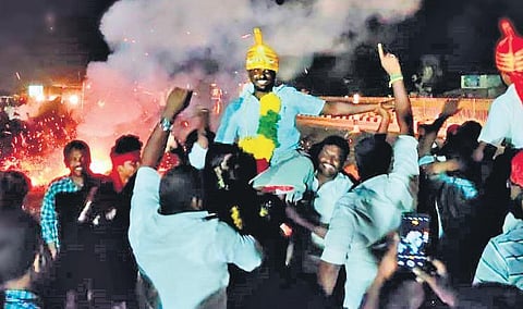 DMK cadre celebrating at Muthur panchayat near Tirunelveli on Wednesday | Express