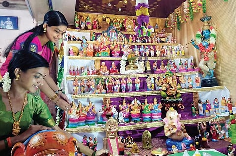Two women belonging to Valiyasala agraharam, Thiruvananthapuram, giving finishing touches to their bommakolu on the eve of Mahanavami | Vincent Pulickal