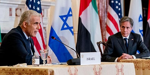 Israeli Foreign Minister Yair Lapid (L) accompanied by Secretary of State Antony Blinken (R) speaks at a joint news conference at the State Department in Washington. (Photo | AP)