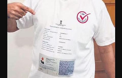 A man clad in vaccination certificate printed T-shirt  in Kerala's Malappuram
