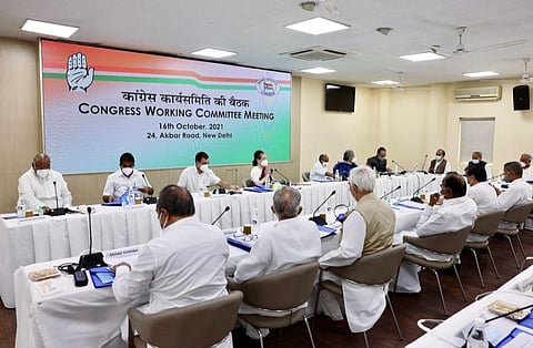 Congress Interim President Sonia Gandhi greets during the Congress Working Committee(CWC) meeting, at the AICC office. (Photo | ANI)