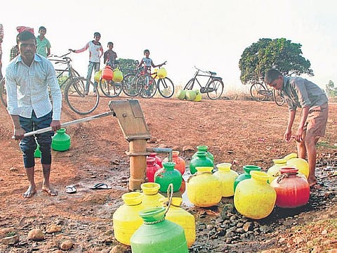 In many rural areas in Karnataka, people still have to trudge kilometres to fetch potable water from sources such as handpumps | Express