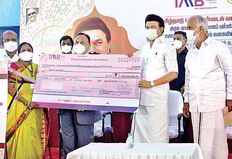 Tamil Nadu Mercantile Bank CEO KV Ramamurthy hands over a cheque for `1 crore to CM MK Stalin | Express