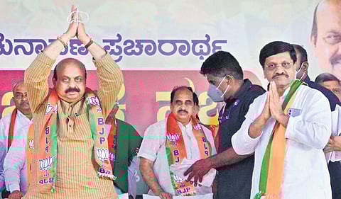 Chief Minister Basavaraj Bommai campaigns for BJP bypoll candidate Shivaraj Sajjanar (right) in Hanagal on Sunday. Hanagal is in Bommai’s home district Haveri making it a must-win battle.