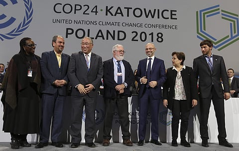 Heads of the delegations react at the end of the final session of the COP24 summit on climate change in Katowice, Poland. (File photo | AP)