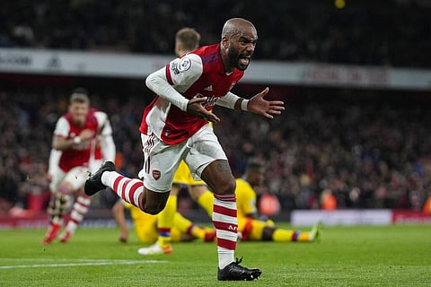 Arsenal's Alexandre Lacazette celebrates after scoring goal to equalize match during against Crystal Palace at Emirates Stadium in London, England, Monday. (Photo | AP)