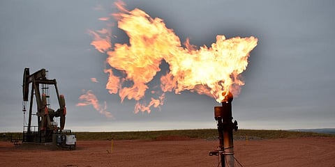 a flare burns natural gas at an oil well Aug. 26, 2021, in Watford City, North Dakota. (Representational Image | AP)