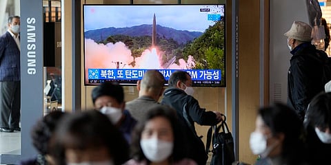 A TV screen showing a news program reporting about North Korea's missile launch with file footage is seen at a train station in Seoul, South Korea, Tuesday, Oct. 19, 2021. (Photo | AP)