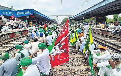 Farmers block railway tracks near Delhi to press their demand of the dismissal and arrest of Union Minister Ajay Mishra. (Photo | Shekhar Yadav, EPS)