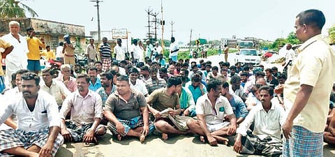Fishermen blocking a road in Kottaipattinam on Tuesday morning, alleging that the mid-sea collision with a Sri Lankan Navy vessel was not an accident | Express