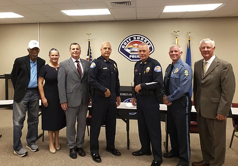 This photo released by the Gulf Shores Police Department shows actor Morgan Freeman, left, with six other members of a panel that interviewed police recruits in Gulf Shores, Ala., on Friday, Oct. 15.