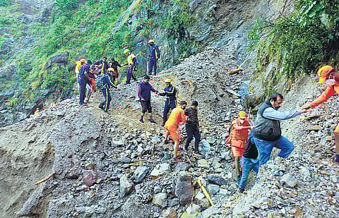 Stranded tourists being evacuated from the landslide affected area of Khairna in Nainital on Wednesday | PTI