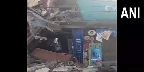 A call about the collapse was received around 1.20 pm following which three fire tenders were rushed to the spot. (Photo | ANI)