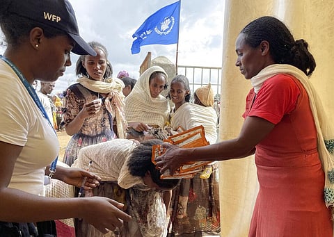 World Food Programme (WFP) workers screen for malnutrition and distribute food to communities in the Adi Daero district of the Tigray region of northern Ethiopia. (File Photo | AP)