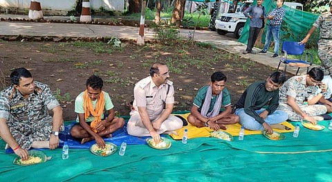 Sukma SP Sunil Sharma having meal with the surrendered Maoists.