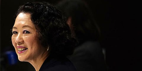 Tomoko Yoshino, the first female leader of Japanese Trade Union Confederation (Rengo) speaks during a press conference at Foreign Correspondents' Club of Japan, Oct. 22, 2021, in Tokyo. (Photo | AP)