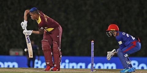 West Indies' Shimron Hetmyer plays a shot during the Cricket Twenty20 World Cup warm-up match against Afghanistan. (Photo | AP)