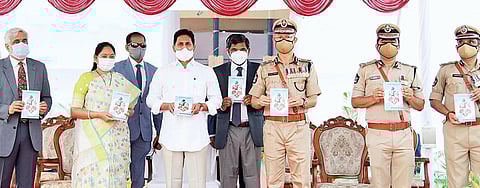 Chief Minister YS Jagan Mohan Reddy, DGP D Gautam Sawang, Home Minister Mekathoti Sucharita during the Police Commemoration Day event at IGMC Stadium in Vijayawada on Thursday | Express