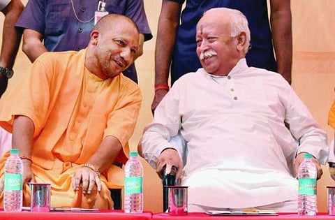 UP Chief Minister Yogi Adityanath and RSS chief Mohan Bhagwat (File photo| PTI)