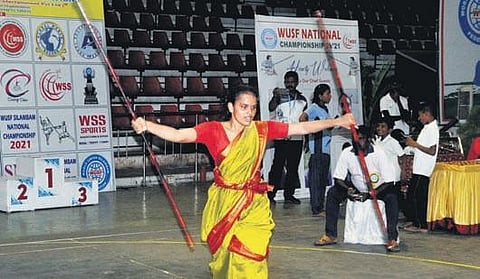 Vinila Manikanta demonstrates her martial art skills at the Silambam National Championship in Visakhapatnam on Friday I G satyanarayana