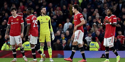 Manchester United players react during a Premier League match against Liverpool at Old Trafford. (Photo| AP)