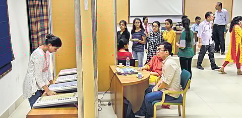 File photos from 2018 of students queuing up to cast their votes for DUSU election at Miranda College.