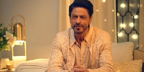Shah Rukh Khan in the recent Cadbury ad batting for local stores. (Photo | YouTube screengrab)