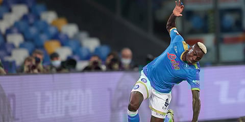 Napoli's Victor Osimhen celebrates after scoring a goal during am Europa League match against Legia in Naples. (Photo| AP)
