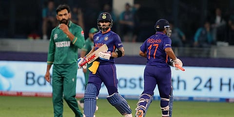 India's Virat Kohli Rishabh Pant run between the wickets during the T20 World Cup match against Pakistan at Dubai International Stadium. (Photo| ANI)