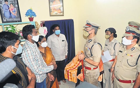 DGP Gautam Sawang meets family members of Katta Veera Venkata Ramana, a head constable who died of Covid, in Rajamahendravaram on Tuesday I Express