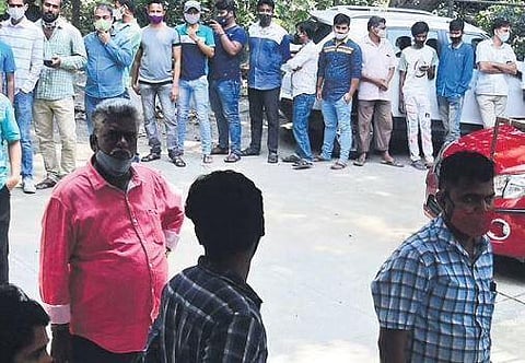 Beneficiaries wait in line outside Dasappa Hospital for their jab in Bengaluru on Tuesday | Shriram BN