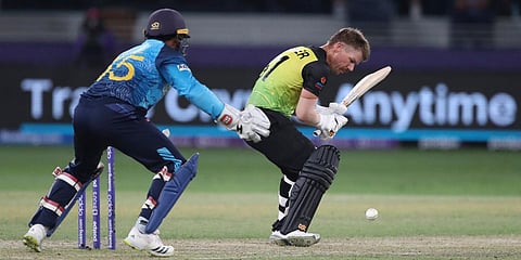 Australia's David Warner attempts to play a shot during a T20 World Cup match against Sri Lanka in Dubai. (Photo| AP)
